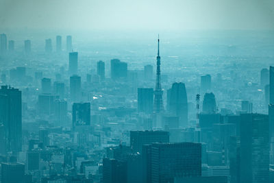 Modern buildings in city against sky