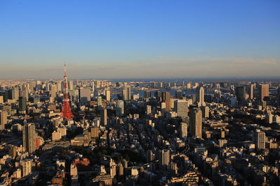 Aerial view of cityscape against clear sky