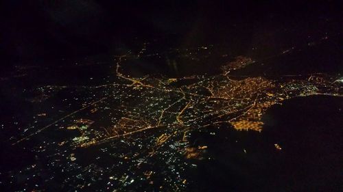 Aerial view of illuminated cityscape