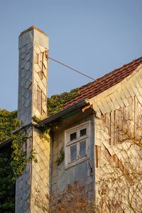 Low angle view of building against clear sky