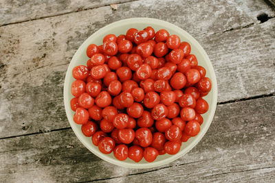 High angle view of strawberries in bowl on table