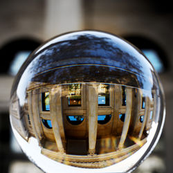 Close-up of water drops on glass of building