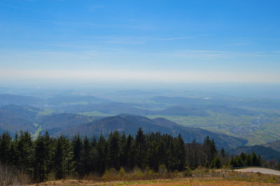 Scenic view of tree mountains against sky