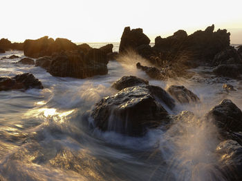 Scenic view of sea against clear sky