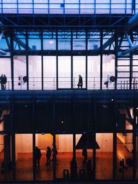 People walking at railroad station