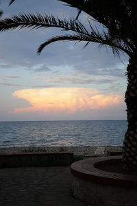 Scenic view of sea against sky at sunset