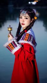 Young woman wearing mongolian tradisional clothes