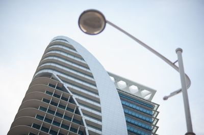 Low angle view of modern building against sky