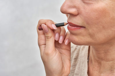 Close-up of man smoking