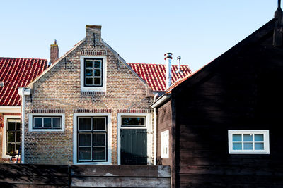 Low angle view of residential building against sky