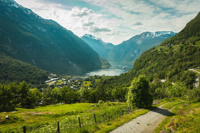 Scenic view of landscape and mountains against sky