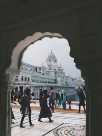 Tourists in front of historic building