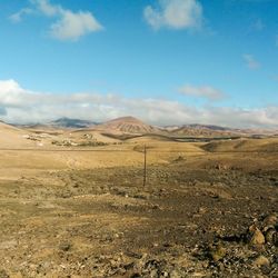 Scenic view of desert against sky