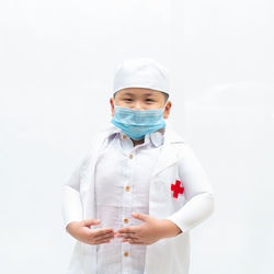 Full length of a man standing on white background