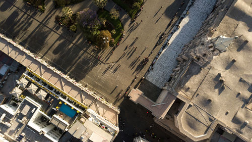 High angle view of street amidst buildings in city