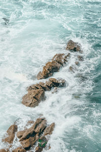 Scenic view of rocks in sea