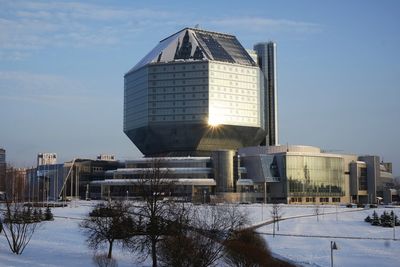 Water tower against sky during winter