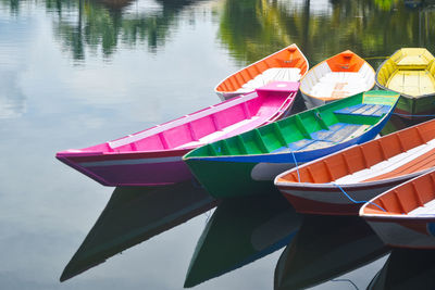 High angle view of multi colored boats moored in lake