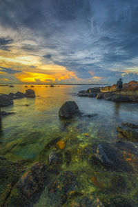 Scenic view of sea against sky during sunset