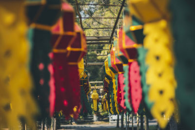 Low angle view of illuminated lanterns hanging in temple