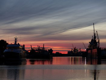 Silhouette of harbor at sunset