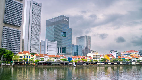 Buildings in singapore city against sky