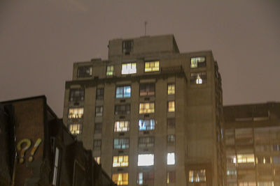 Low angle view of building against sky at night