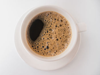 High angle view of coffee cup on table