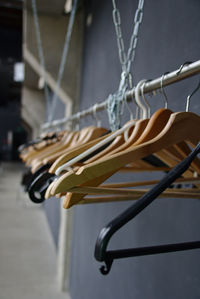 Close-up of bicycle hanging on rack
