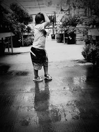 Full length of woman standing in park