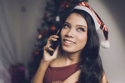 Beautiful young asian female posing for christmas celebration and festival.