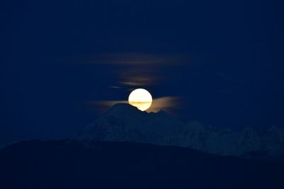 Scenic view of moon against sky at night