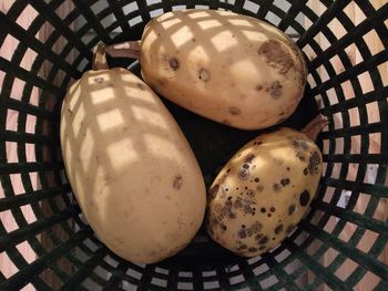 High angle view of eggs in basket on table