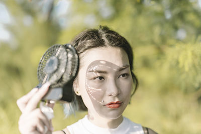 Close-up portrait of young woman