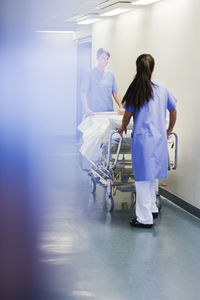 Nurses walking through corridor