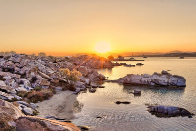 Scenic view of sea against sky during sunset