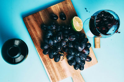 High angle view of grapes in glass on table