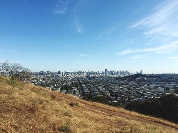 Cityscape against blue sky