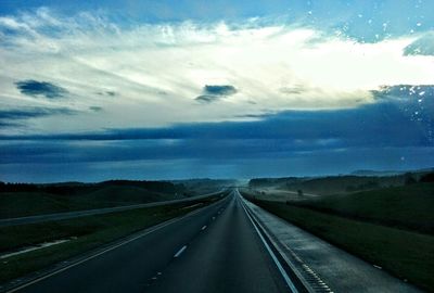 Country road passing through landscape