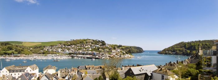 Panoramic view of bay against clear sky