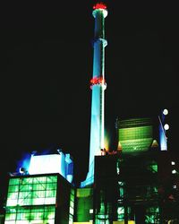 Low angle view of illuminated lights at night