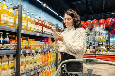 Portrait of woman standing in store