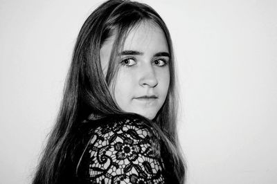 Close-up young woman over white background