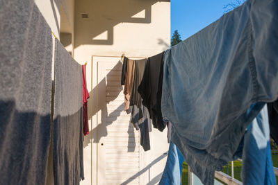 Rear view of person drying outdoors