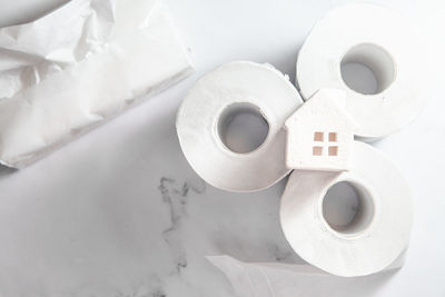 High angle view of papers on white table