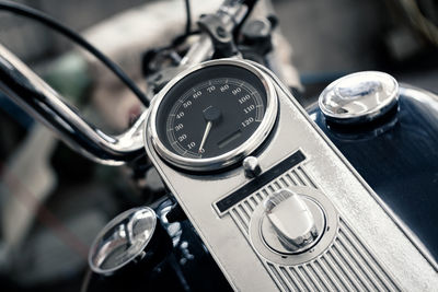 Close-up of motorcycle speedometer