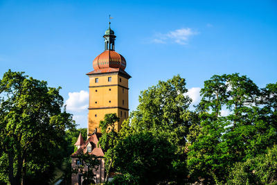 Low angle view of building against blue sky