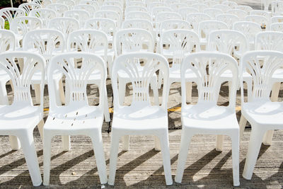 High angle view of arranged empty chairs outdoors
