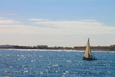 Boat sailing in sea