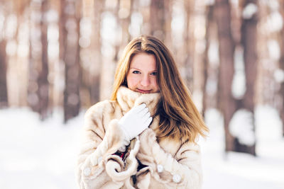 Portrait of woman in snow